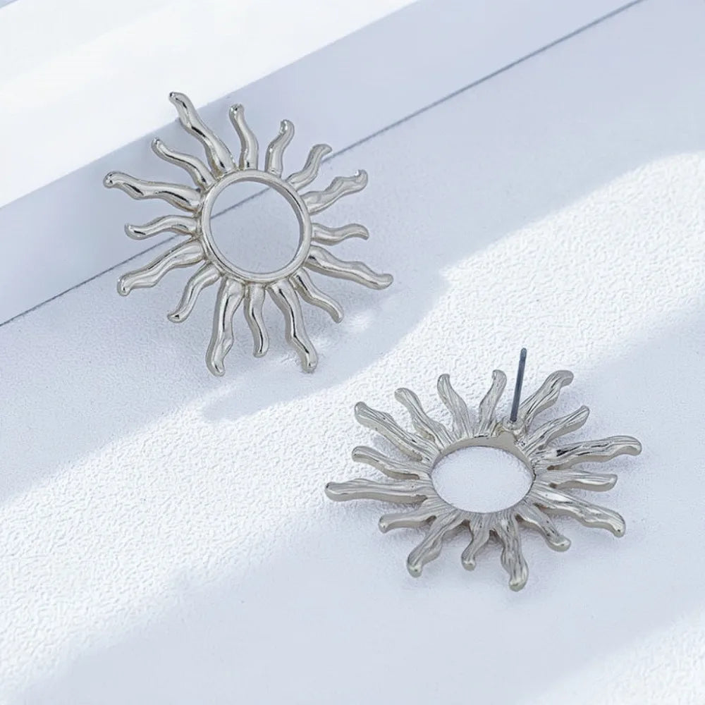 Brincos Retro Dourados/Prata – Flor do Sol