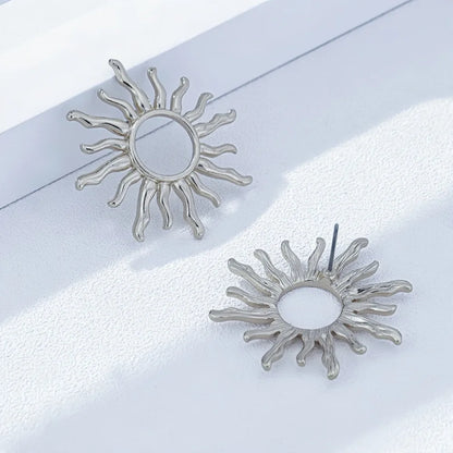 Brincos Retro Dourados/Prata – Flor do Sol