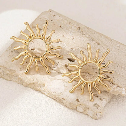 Brincos Retro Dourados/Prata – Flor do Sol