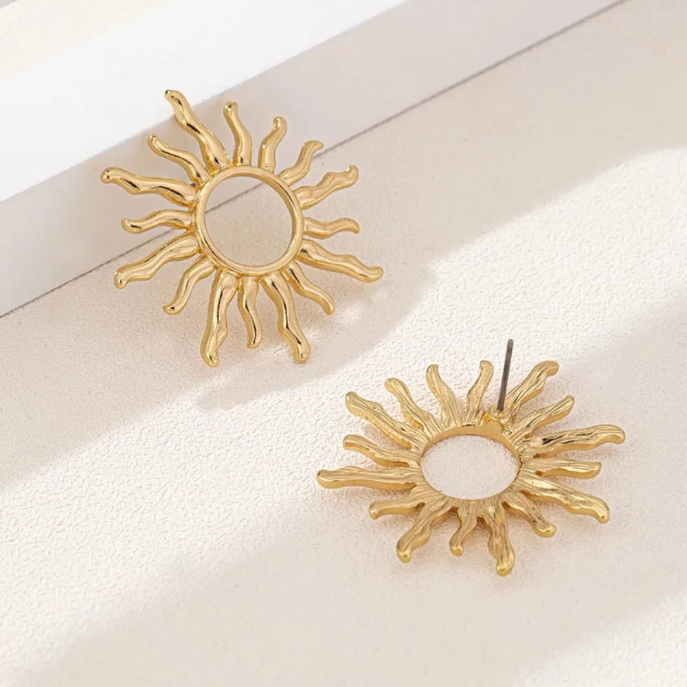 Brincos Retro Dourados/Prata – Flor do Sol