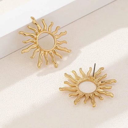 Brincos Retro Dourados/Prata – Flor do Sol
